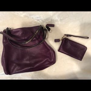 Coach dark purple pocketbook and wristlet set!